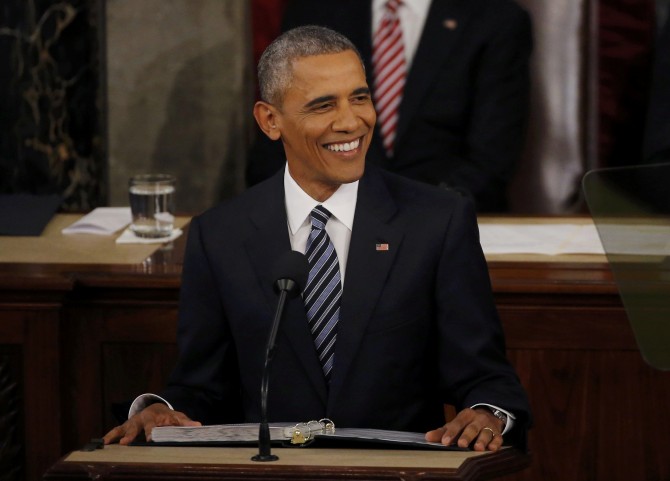 U.S. President Barack Obama smiles as he delivers his State of the Union address to a joint session of Congress in Washington, January 12, 2016. REUTERS/Carlos Barria