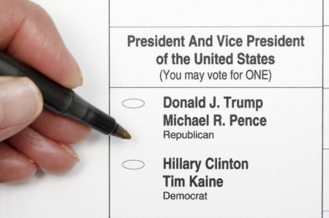A sample ballot is seen in a photo illustration, as early voting for the 2016 general elections began in North Carolina, in Chapel Hill, North Carolina, U.S. October 20, 2016. REUTERS/Jonathan Drake