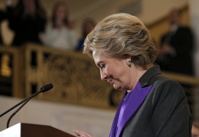Hillary Clinton pauses as she addresses her staff and supporters about the results of the U.S. election at a hotel in the Manhattan borough of New York, U.S., November 9, 2016. REUTERS/Brian Snyder