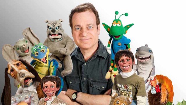 Joe Gandelman, with his dummies, works as a professional ventriloquist. Photo via familyentertainer.com