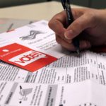 Voter with mail ballot