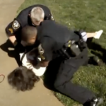 Atlant police manhandle professor