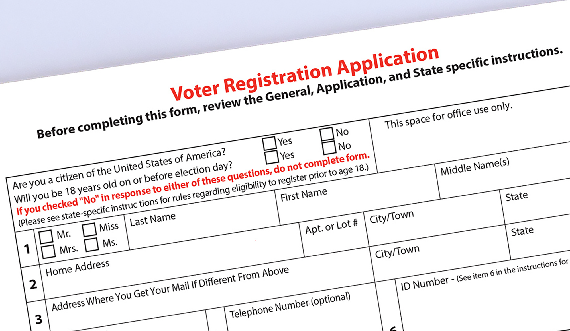 close up of US voter registration form with pen